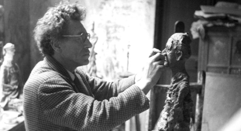 Alberto Giacometti in his studio in Montparnasse, Paris, photographed by his wife Annette.