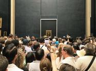 Crowds in front of the Mona Lisa in the Louvre in Paris