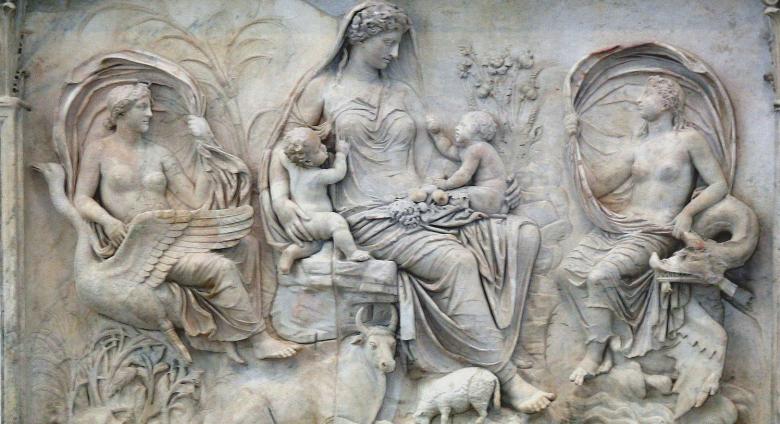 The so-called Tellus panel from the Ara Pacis, ca 9 BCE. Here a goddess, likely the personification of Pax (Peace) or Tellus (the Earth), is surrounded by natural fecundity and symbols of plenty. This panel combined with the other mytho-historical images of the building are an imagery combination of commemorative Roman art. The Ara Pacis has been reassembled in the Museo dell’Ara Pacis in Rome. 